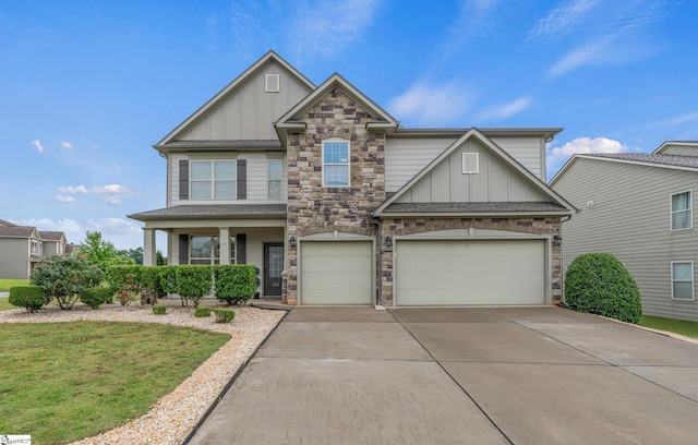 101 Kings Heath Ln, Simpsonville, SC 29680 - craftsman house featuring board and batten siding, stone siding, concrete driveway, and a garage