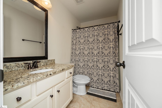 101 Kings Heath Ln, Simpsonville, SC 29680 - full bath featuring vanity, toilet, and tile patterned flooring