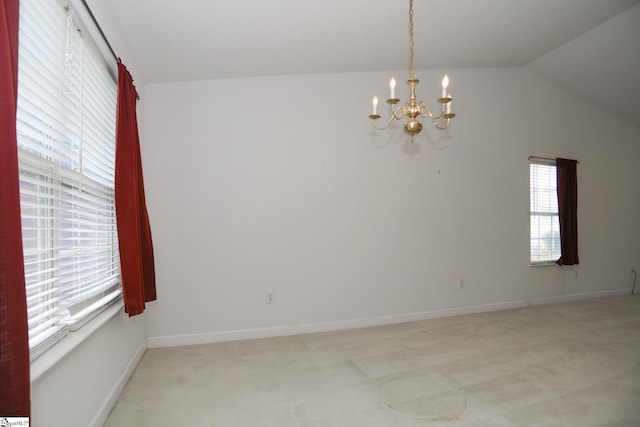 7 Pergola Pl, Simpsonville, SC 29680 - spare room with a chandelier, light colored carpet, vaulted ceiling, and baseboards