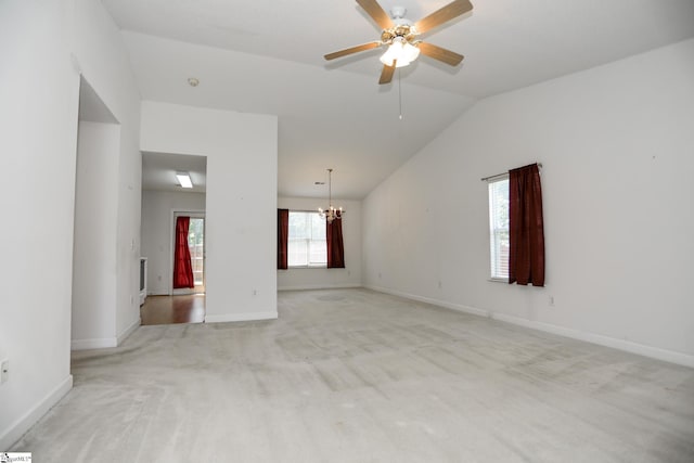 7 Pergola Pl, Simpsonville, SC 29680 - empty room with a chandelier, vaulted ceiling, light colored carpet, a ceiling fan, and baseboards