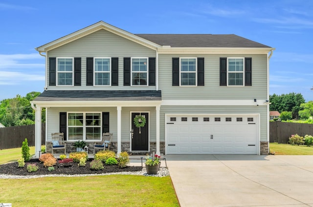 7110 Luna Mae Ct, Boiling Springs, SC 29316 - view of front of property with covered porch, driveway, stone siding, and an attached garage