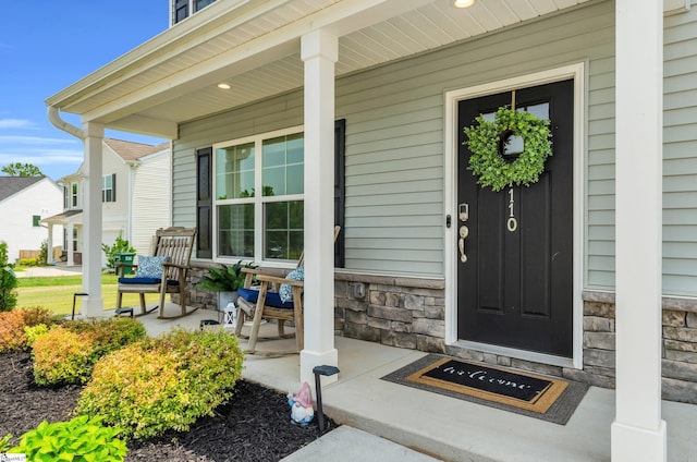 7110 Luna Mae Ct, Boiling Springs, SC 29316 - property entrance featuring covered porch and stone siding