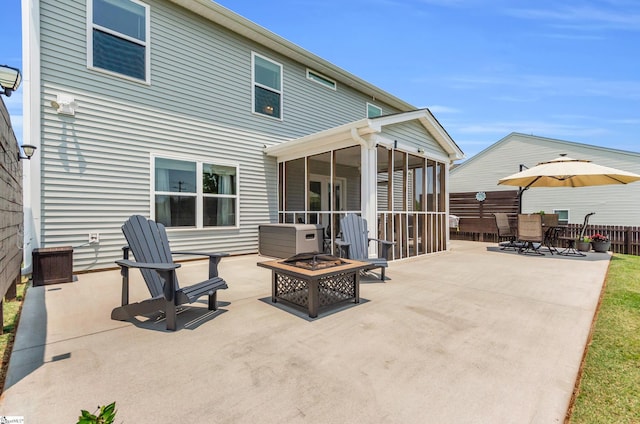 7110 Luna Mae Ct, Boiling Springs, SC 29316 - view of patio featuring a sunroom and an outdoor fire pit