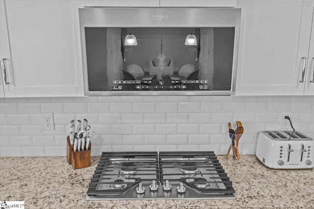 466 Fox Run Trl, Woodruff, SC 29388 - kitchen view of stainless steel appliances, tasteful backsplash, white cabinets, and light stone countertops