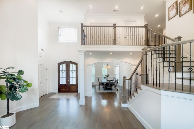740 N Alamosa Dr, Boiling Springs, SC 29316 - foyer featuring arched walkways, french doors, stairway, wood finished floors, and a towering ceiling