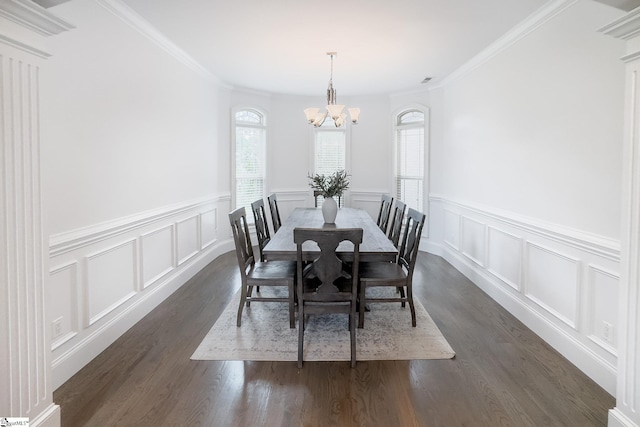 740 N Alamosa Dr, Boiling Springs, SC 29316 - dining area featuring a chandelier, dark wood-style flooring, a decorative wall, a wainscoted wall, and ornamental molding
