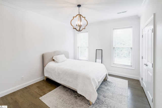 740 N Alamosa Dr, Boiling Springs, SC 29316 - bedroom featuring crown molding, a chandelier, baseboards, and dark wood finished floors
