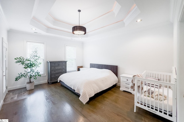 740 N Alamosa Dr, Boiling Springs, SC 29316 - bedroom with ornamental molding, a tray ceiling, wood finished floors, recessed lighting, and baseboards