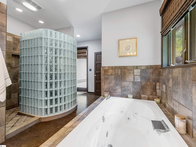 380 Montagu Dr, Spartanburg, SC 29301 - full bathroom featuring a jetted tub, walk in shower, and recessed lighting