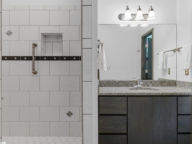 380 Montagu Dr, Spartanburg, SC 29301 - bathroom featuring vanity and a tile shower