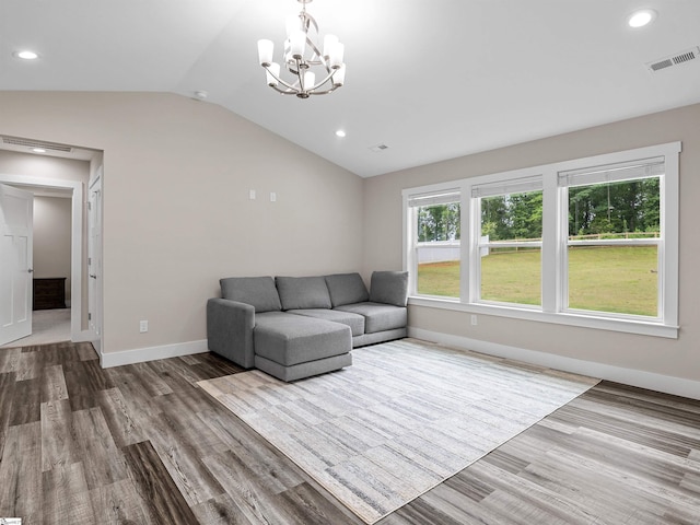197 Falling Creek Rd, Spartanburg, SC 29301 - living room featuring wood finished floors, vaulted ceiling, baseboards, a chandelier, and recessed lighting