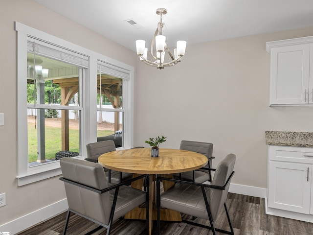197 Falling Creek Rd, Spartanburg, SC 29301 - dining area featuring baseboards, a chandelier, and dark wood finished floors