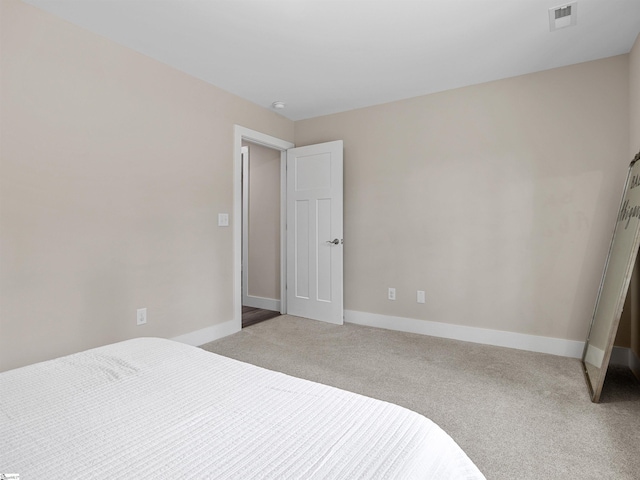 197 Falling Creek Rd, Spartanburg, SC 29301 - bedroom with light carpet and baseboards