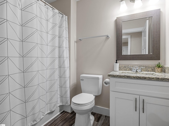 197 Falling Creek Rd, Spartanburg, SC 29301 - full bathroom with vanity, toilet, wood finished floors, a shower with curtain, and baseboards