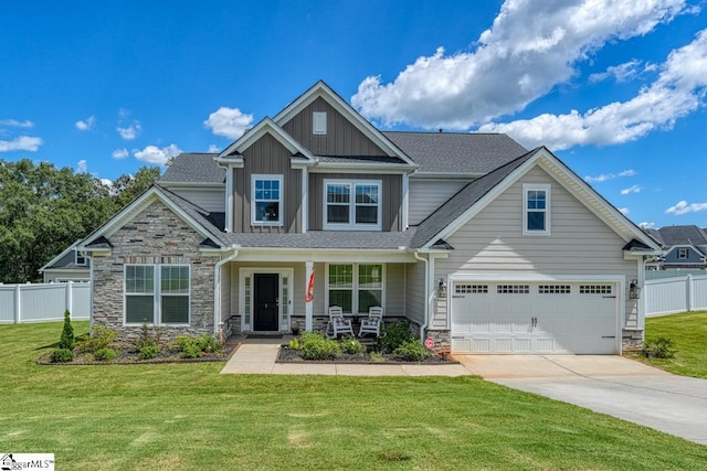 2 Stony Run Ln, Simpsonville, SC 29681 - craftsman-style home with board and batten siding, driveway, a porch, and stone siding