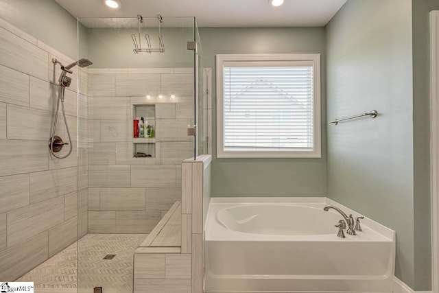 2 Stony Run Ln, Simpsonville, SC 29681 - bathroom featuring a bath, a stall shower, and recessed lighting