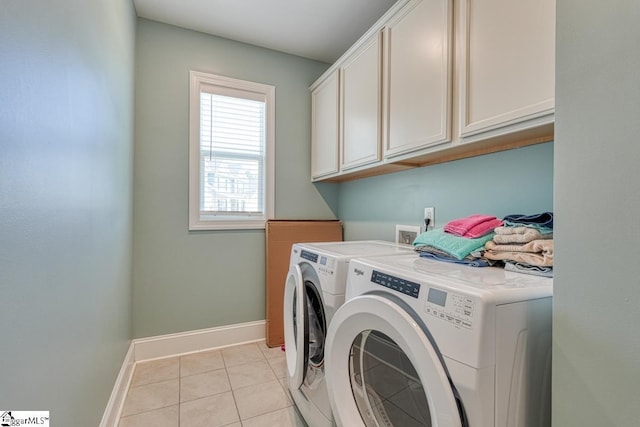 2 Stony Run Ln, Simpsonville, SC 29681 - laundry room with washing machine and dryer, cabinet space, baseboards, and light tile patterned flooring