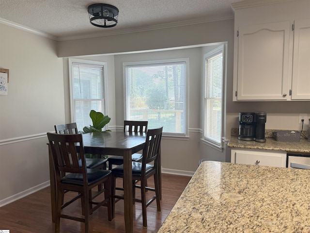 111 Firethorne Ct, Greer, SC 29650 - dining space featuring dark wood-type flooring, ornamental molding, a textured ceiling, and baseboards