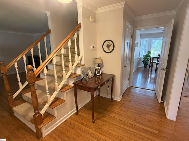 111 Firethorne Ct, Greer, SC 29650 - staircase featuring wood finished floors, baseboards, and crown molding