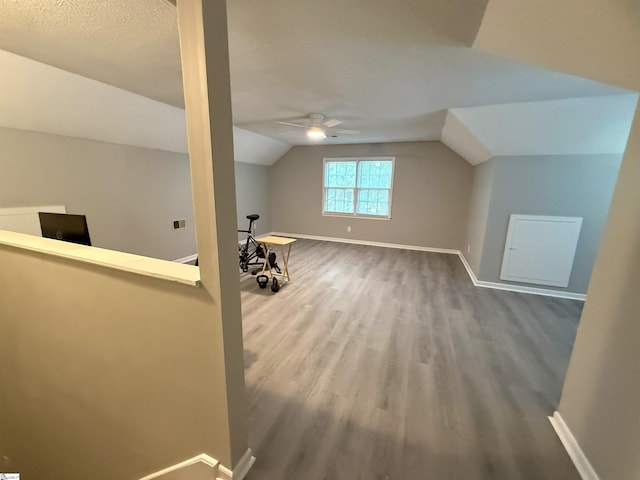 111 Firethorne Ct, Greer, SC 29650 - additional living space with ceiling fan, wood finished floors, baseboards, and lofted ceiling