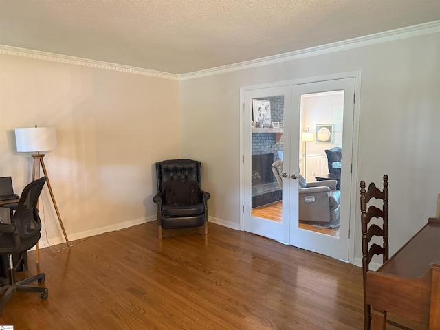 111 Firethorne Ct, Greer, SC 29650 - office area featuring wood finished floors, ornamental molding, french doors, a textured ceiling, and baseboards