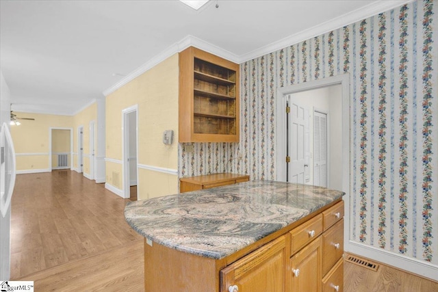 107 Cinder Creek Ln, Spartanburg, SC 29307 - kitchen featuring light wood finished floors, ornamental molding, light stone countertops, and open shelves