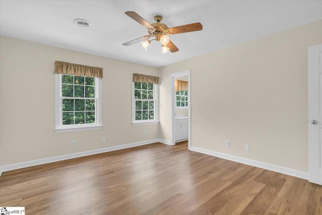 107 Cinder Creek Ln, Spartanburg, SC 29307 - empty room featuring wood finished floors, a ceiling fan, and baseboards