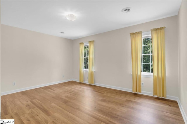 107 Cinder Creek Ln, Spartanburg, SC 29307 - unfurnished room featuring healthy amount of natural light, light wood-style floors, and baseboards