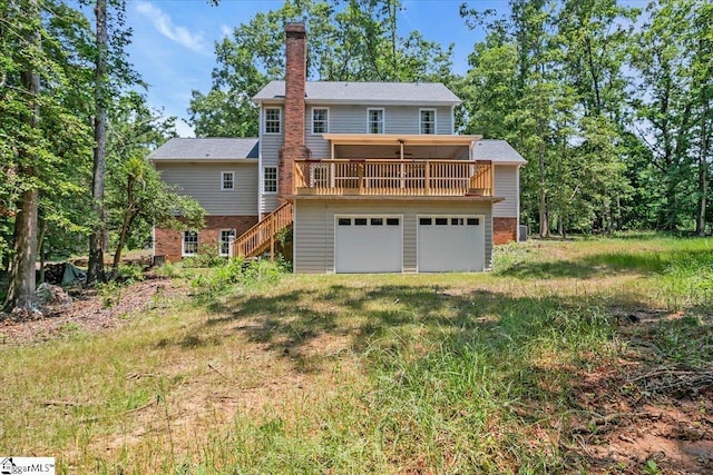 107 Cinder Creek Ln, Spartanburg, SC 29307 - back of house featuring a chimney, a wooden deck, stairs, a garage, and brick siding