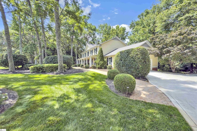 103 Brandon Way, Simpsonville, SC 29681 - view of side of home featuring concrete driveway and a yard