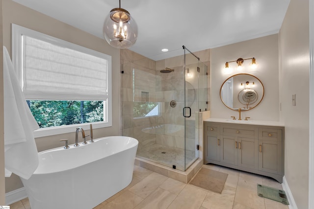 103 Brandon Way, Simpsonville, SC 29681 - full bathroom with a freestanding tub, a stall shower, vanity, and baseboards