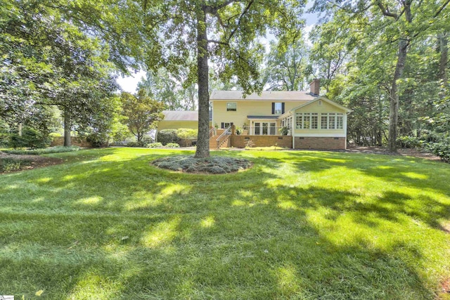 103 Brandon Way, Simpsonville, SC 29681 - back of property featuring a chimney, a lawn, and crawl space