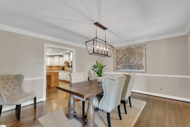 103 Brandon Way, Simpsonville, SC 29681 - dining room with ornamental molding, dark wood finished floors, baseboards, and a chandelier