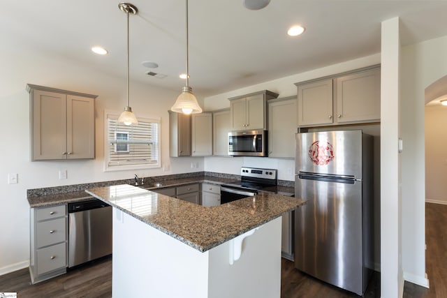 249 Samuel St, Pendleton, SC 29670 - kitchen featuring appliances with stainless steel finishes, gray cabinets, dark wood-style floors, dark stone countertops, and recessed lighting