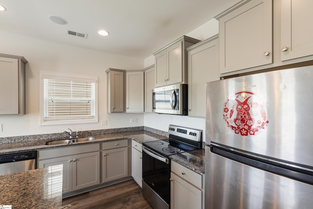 249 Samuel St, Pendleton, SC 29670 - kitchen with appliances with stainless steel finishes, a sink, gray cabinets, recessed lighting, and dark stone counters