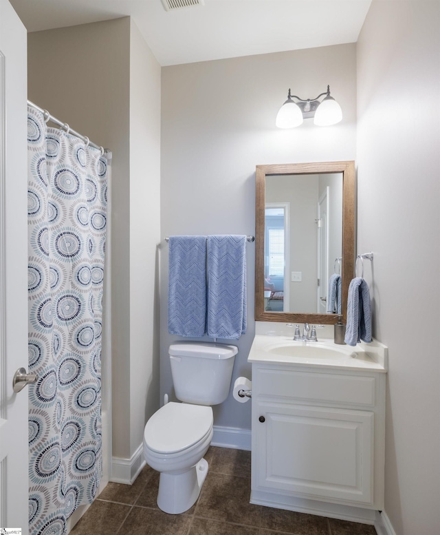19 Edge Ct Unit A, Greenville, SC 29609 - bathroom featuring toilet, vanity, tile patterned floors, baseboards, and curtained shower