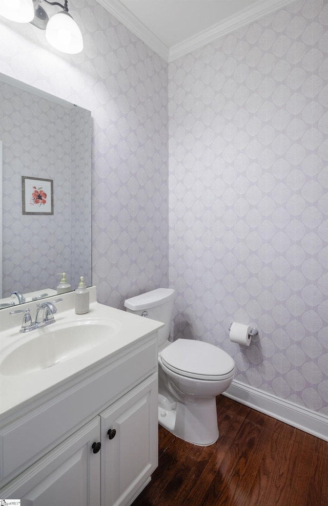 19 Edge Ct Unit A, Greenville, SC 29609 - bathroom with wallpapered walls, wood finished floors, crown molding, toilet, and vanity