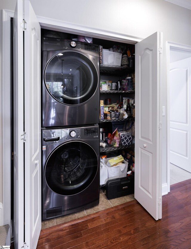 19 Edge Ct Unit A, Greenville, SC 29609 - washroom featuring estacked washer and dryer and wood finished floors