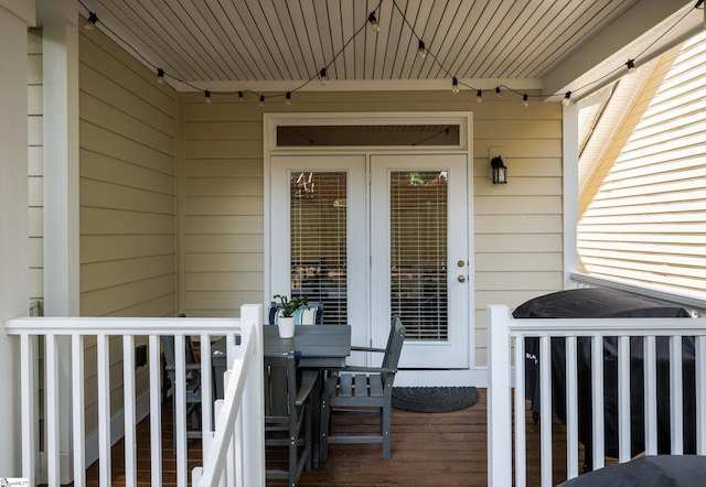 19 Edge Ct Unit A, Greenville, SC 29609 - view of exterior entry featuring outdoor dining space and a deck