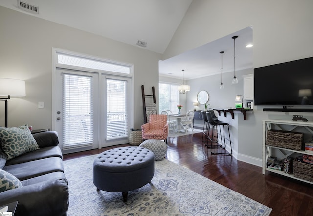 19 Edge Ct Unit A, Greenville, SC 29609 - living area with dark wood-style flooring, lofted ceiling, a chandelier, and baseboards