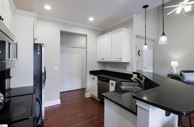 19 Edge Ct Unit A, Greenville, SC 29609 - kitchen featuring appliances with stainless steel finishes, a sink, dark wood finished floors, a peninsula, and white cabinetry