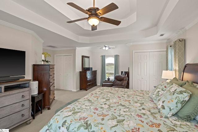 4 Jester Ct, Simpsonville, SC 29681 - bedroom with light carpet, a raised ceiling, multiple closets, a ceiling fan, and ornamental molding