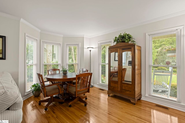 4 Jester Ct, Simpsonville, SC 29681 - dining space featuring crown molding and light wood finished floors
