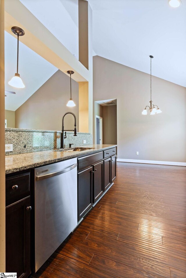 30 Caperton Way, Greer, SC 29651 - kitchen with stainless steel dishwasher, a sink, dark wood-style floors, backsplash, and pendant lighting