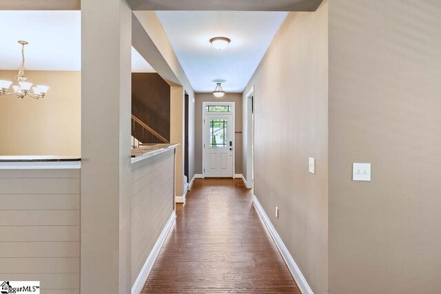 30 Caperton Way, Greer, SC 29651 - entryway featuring a chandelier, baseboards, dark wood-style flooring, and stairs