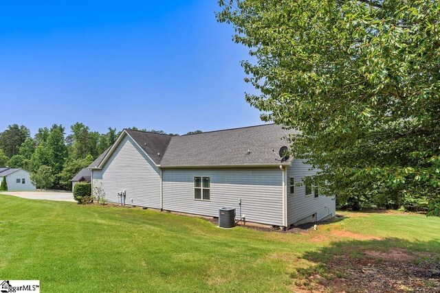 30 Caperton Way, Greer, SC 29651 - view of side of property featuring a yard, cooling unit, crawl space, and a shingled roof