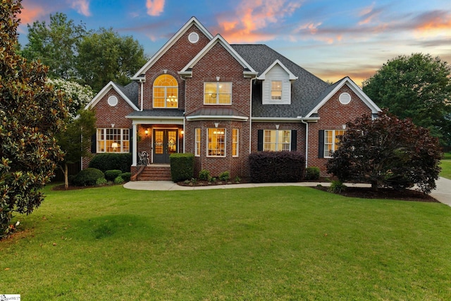 5 Fife Ct, Simpsonville, SC 29681 - traditional home featuring french doors, brick siding, a lawn, and roof with shingles