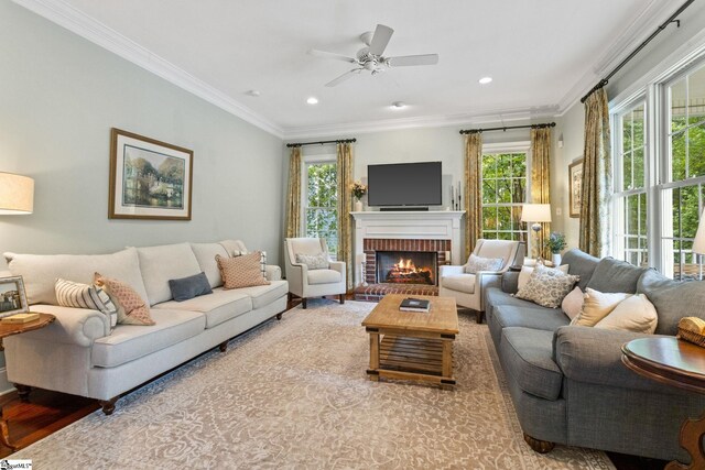 5 Fife Ct, Simpsonville, SC 29681 - living room with plenty of natural light, a fireplace, a ceiling fan, ornamental molding, and recessed lighting