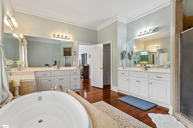 5 Fife Ct, Simpsonville, SC 29681 - full bath with crown molding, two vanities, a bath, wood finished floors, and a stall shower