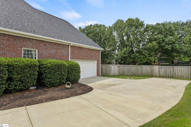 5 Fife Ct, Simpsonville, SC 29681 - view of patio featuring driveway and an attached garage
